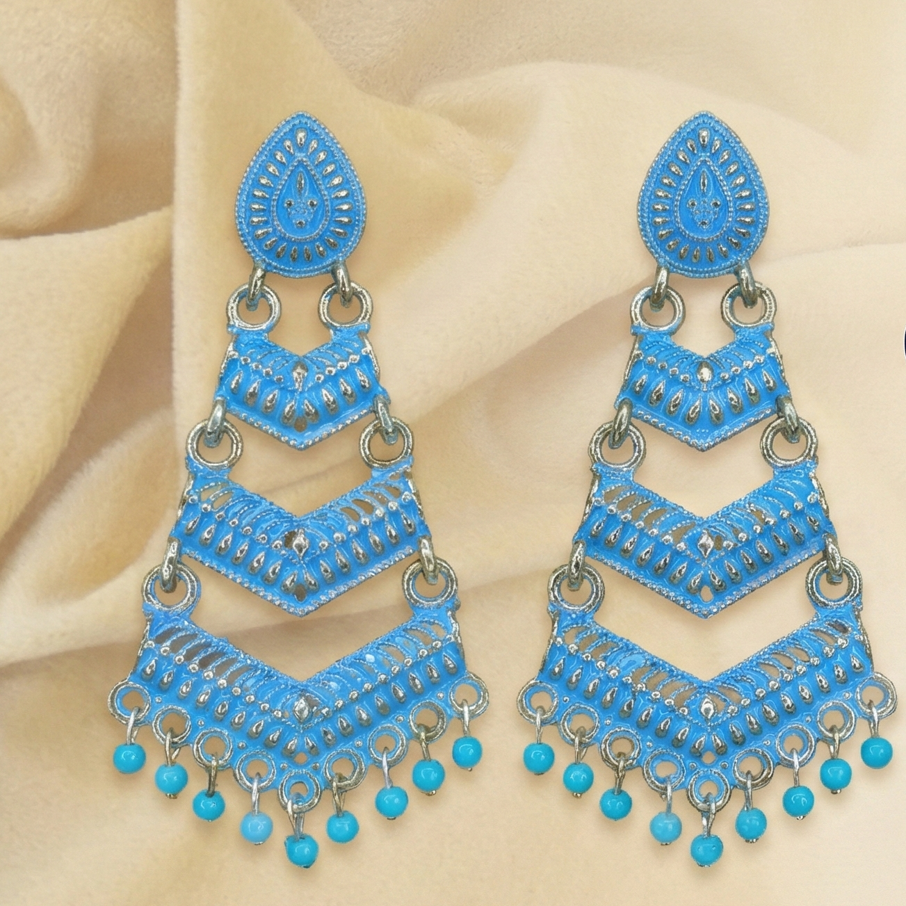 Close-up view of premium artificial Blue Meenakari Gold Plated Layered Drop Earrings with Pearl Hanging by Innovate Art Impex.