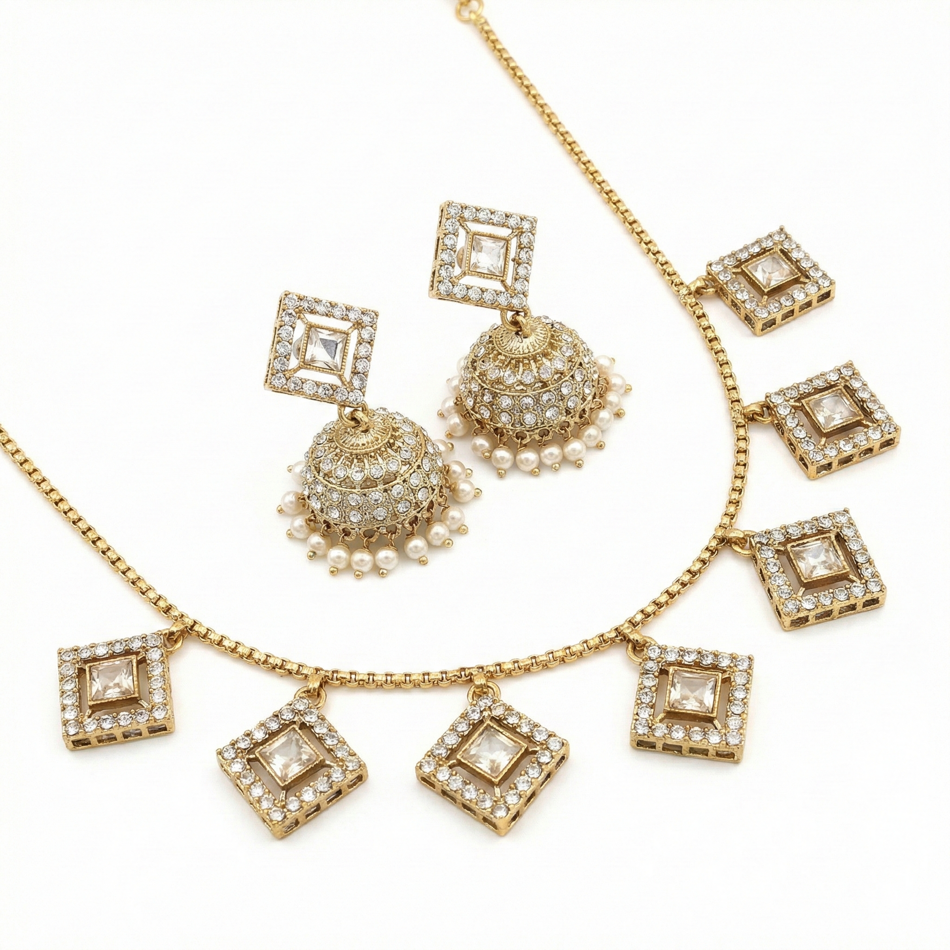 Close-up view of premium artificial Elegant Square CZ Imitation Necklace and Pearl Drop Jhumka Set by Innovate Art Impex.