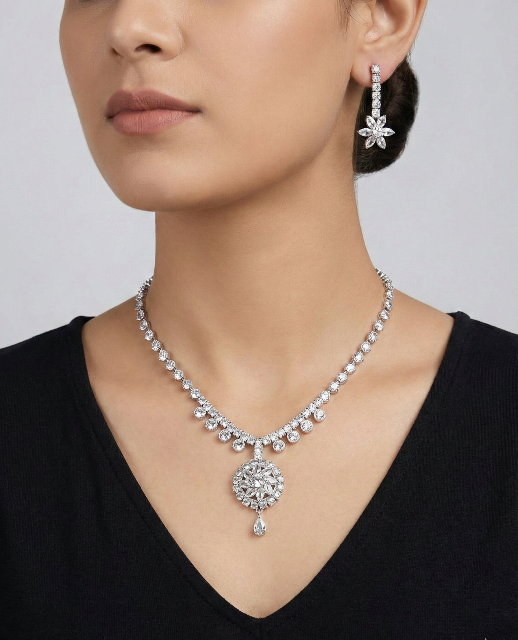 Close-up view of premium artificial Elegant Silver Floral Drop Bridal Jewelry Set (Necklace & Earrings) by Innovate Art Impex.
