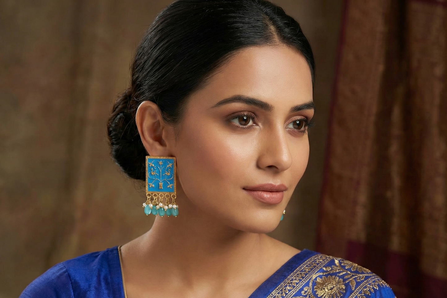 Close-up view of premium artificial Firozi Meenakari Gold Plated Pearl Drop Earrings for Women | Traditional Ethnic Dangle Earrings by Innovate Art Impex.