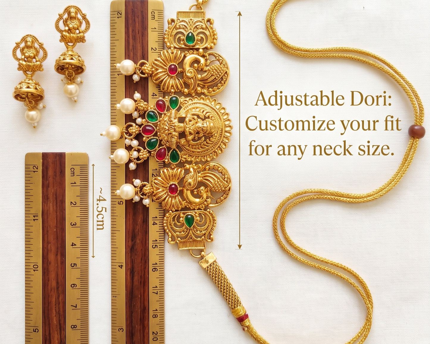 Gold necklace with adjustable dori, earrings, and measurement rulers on a white background.