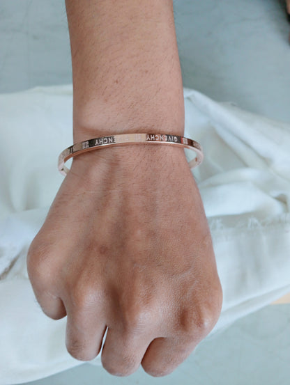 Close-up view of premium artificial INNOVATE ART IMPEX Premium Rose Gold Engraved Hinged Bangle Bracelet for Women by Innovate Art Impex.