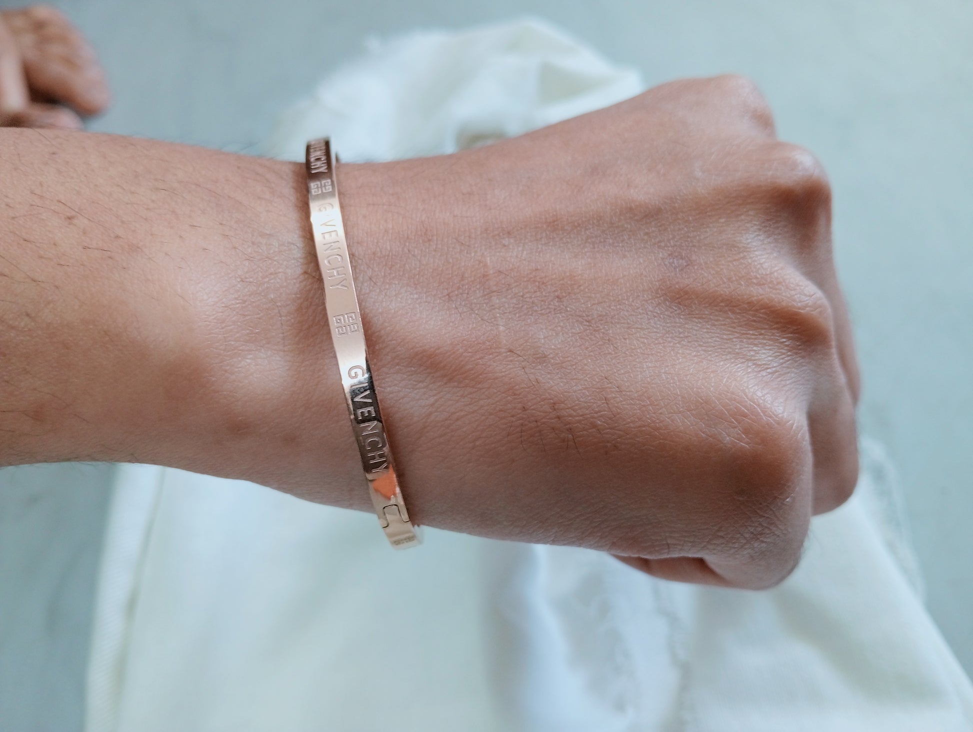 Close-up view of premium artificial INNOVATE ART IMPEX Premium Rose Gold Engraved Hinged Bangle Bracelet for Women by Innovate Art Impex.