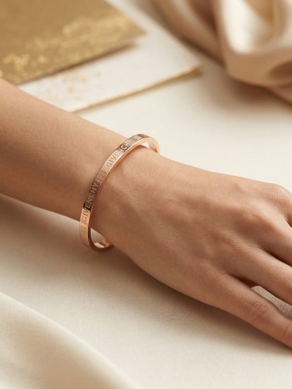Close-up view of premium artificial INNOVATE ART IMPEX Premium Rose Gold Engraved Hinged Bangle Bracelet for Women by Innovate Art Impex.
