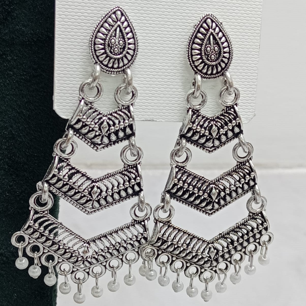 Close-up view of premium artificial Oxidized Silver Traditional Chandelier Earrings for Women by Innovate Art Impex.