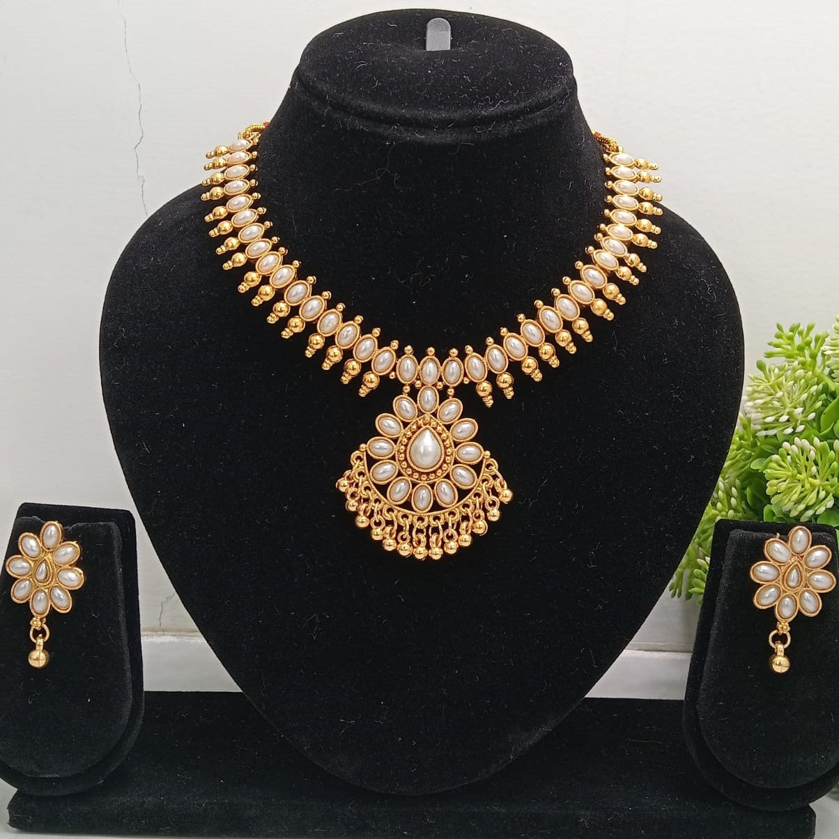 Close-up view of premium artificial Gold Plated White Stone Traditional Necklace Set with Matching Earrings for Women by Innovate Art Impex.