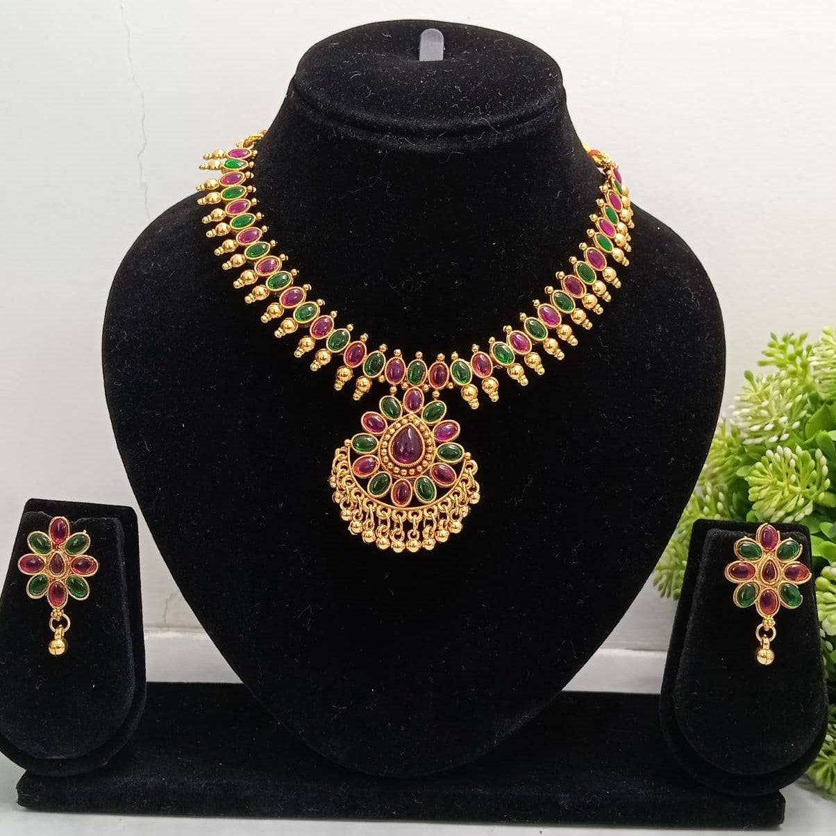 Close-up view of premium artificial Gold Plated Multi Stone Traditional Necklace Set with Matching Earrings for Women by Innovate Art Impex.
