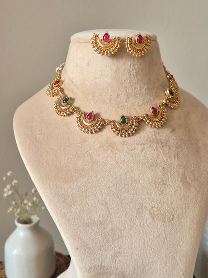Close-up view of premium artificial Traditional Maharashtrian Chandrakor Green & Maroon Stone Necklace Set   Gold Plated by Innovate Art Impex.