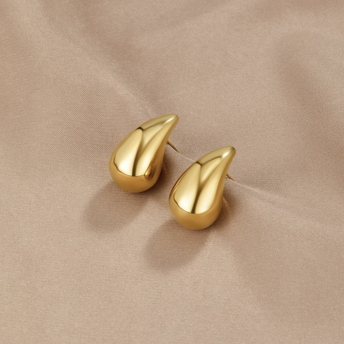Close-up view of premium artificial Gold Plated Teardrop Stud Earrings for Women | Minimalist Daily Wear Earrings by Innovate Art Impex.