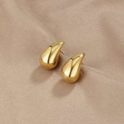 Close-up view of premium artificial Gold Plated Teardrop Stud Earrings for Women | Minimalist Daily Wear Earrings by Innovate Art Impex.