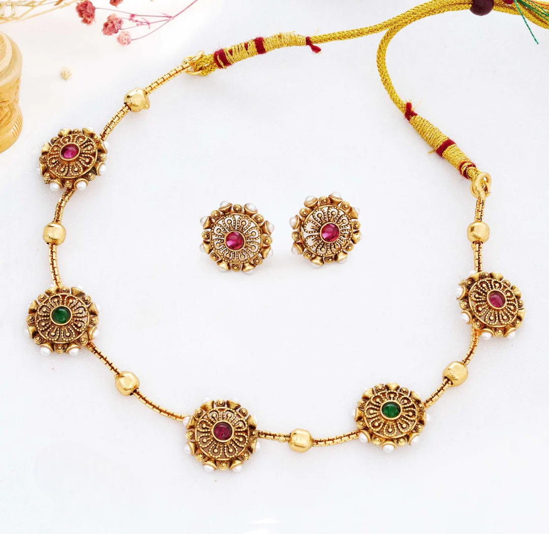 Close-up view of premium artificial Elegant Antique Gold Floral Station Necklace & Earring Set by Innovate Art Impex.