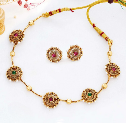 Close-up view of premium artificial Elegant Antique Gold Floral Station Necklace & Earring Set by Innovate Art Impex.