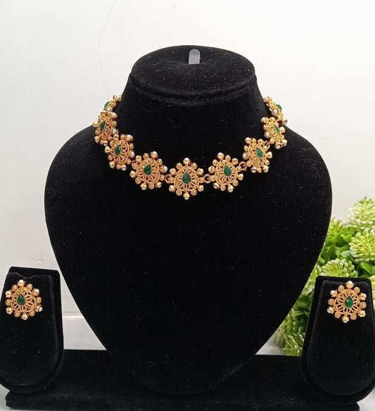 Close-up view of premium artificial Traditional Green Stone Gold Plated Necklace Set with Matching Earrings for Women by Innovate Art Impex.