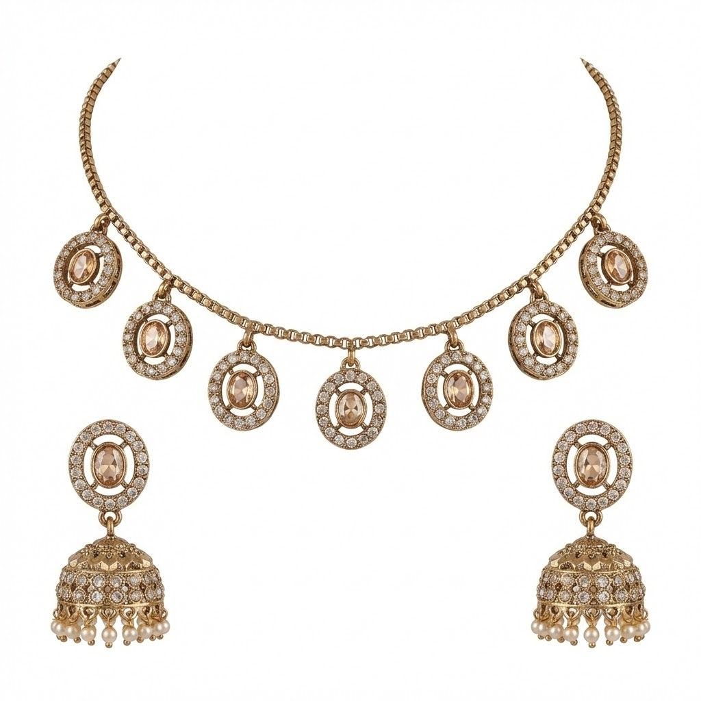 Close-up view of premium artificial Champagne Gold Medallion Charm Necklace & Pearl Drop Jhumka Earring Set by Innovate Art Impex.