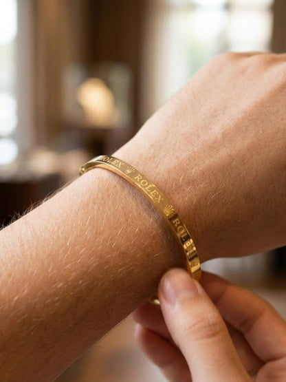 Close-up view of premium artificial Premium Gold-Plated Crown Engraved Bangle | Minimalist Designer Cuff Bracelet for Men & Women by Innovate Art Impex.