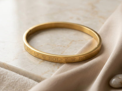 Close-up view of premium artificial Premium Gold-Plated Crown Engraved Bangle | Minimalist Designer Cuff Bracelet for Men & Women by Innovate Art Impex.